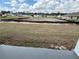 Backyard showing an unfinished lot at 13566 Sw 43Rd Cir, Ocala, FL 34473