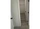 Walk-in closet features wire shelving and sleek gray flooring at 13566 Sw 43Rd Cir, Ocala, FL 34473
