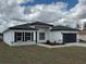 Charming single-story home with a two car garage and landscaped yard at 13566 Sw 43Rd Cir, Ocala, FL 34473
