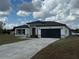 Charming single-story home with a two car garage at 13566 Sw 43Rd Cir, Ocala, FL 34473