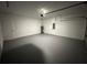 Spacious two car garage with painted floors at 13566 Sw 43Rd Cir, Ocala, FL 34473
