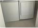 A compact laundry area with a modern side-by-side washer and dryer at 137 Willow Dr, Kissimmee, FL 34759