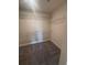 Spacious walk-in closet with ample shelving and plush carpet at 137 Willow Dr, Kissimmee, FL 34759