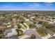Aerial view of a home in a beautiful tree-lined neighborhood at 1581 Monica Joy Cir, Longwood, FL 32779