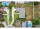 Aerial shot displaying a charming neighborhood and house with great landscaping at 1581 Monica Joy Cir, Longwood, FL 32779