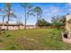 Expansive backyard, enclosed by a white wall and wood fence offering privacy at 1581 Monica Joy Cir, Longwood, FL 32779