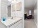 Bathroom with a vanity, mirror, and neutral colors, offering a serene and functional space at 1581 Monica Joy Cir, Longwood, FL 32779