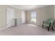 Neutral bedroom with a window, two closets and light beige carpet at 1581 Monica Joy Cir, Longwood, FL 32779