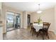 Cozy breakfast nook with tile flooring and sliding glass doors to a screened patio at 1581 Monica Joy Cir, Longwood, FL 32779