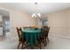 Charming dining room featuring wainscoting, chandelier, and a dining set for Gathering gatherings at 1581 Monica Joy Cir, Longwood, FL 32779