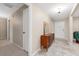 Inviting foyer with tile flooring, fresh paint, and a stylish sideboard table at 1581 Monica Joy Cir, Longwood, FL 32779
