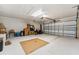 Spacious two car garage interior with ample space for storage and vehicles at 1581 Monica Joy Cir, Longwood, FL 32779