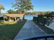 Lakeside property with a boat ramp and picnic shelter, providing easy access to the water at 1581 Monica Joy Cir, Longwood, FL 32779