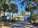 Community waterfront area featuring a covered picnic shelter, boat access, and a view of the lake at 1581 Monica Joy Cir, Longwood, FL 32779