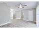 Large living room featuring wood floors, neutral paint and a ceiling fan at 1797 31St Nw St, Winter Haven, FL 33881