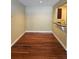 Dining area with hardwood floors and a pass-through to the kitchen at 2019 Dixie Belle Dr # 2019O, Orlando, FL 32812