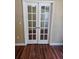 Elegant glass french doors lead to a bright, well-lit room at 2019 Dixie Belle Dr # 2019O, Orlando, FL 32812