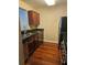Kitchen featuring stainless steel appliances, granite countertops, and dark wood cabinets at 2019 Dixie Belle Dr # 2019O, Orlando, FL 32812