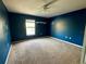 Large bedroom featuring carpeting, a ceiling fan, a window, and closet space at 2143 Tealwood Cir, Tavares, FL 32778