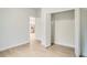 Light and airy bedroom with bi-fold closet doors and an open doorway at 2252 Sw 168Th Loop, Ocala, FL 34473