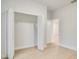 Light and airy bedroom with bi-fold closet doors and an open doorway at 2252 Sw 168Th Loop, Ocala, FL 34473