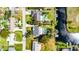 Aerial shot showcasing a neighborhood with canal access, pools, and neatly landscaped yards at 2431 Westwood Dr, Longwood, FL 32779