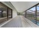 Expansive outdoor balcony with screened enclosure overlooking backyard at 2431 Westwood Dr, Longwood, FL 32779