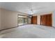 Large bedroom with carpet flooring and access to outdoor balcony at 2431 Westwood Dr, Longwood, FL 32779