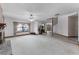 Spacious living room with large window, carpet, fireplace and spiral staircase at 2431 Westwood Dr, Longwood, FL 32779
