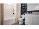 Modern bathroom featuring a shower-tub combo and granite vanity at 2660 Gouda Dr, Apopka, FL 32703
