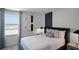 Comfortable bedroom with stylish wall accents and soft, inviting bedding at 2660 Gouda Dr, Apopka, FL 32703