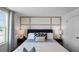 Inviting bedroom featuring designer headboard, plush bedding, and ambient lighting at 2660 Gouda Dr, Apopka, FL 32703
