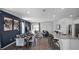 Bright open living space featuring stylish dining area, modern kitchen, and cozy seating at 2660 Gouda Dr, Apopka, FL 32703