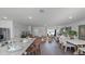 Inviting living room featuring an open floor plan and seamless flow from kitchen to living area at 2664 Gouda Dr, Apopka, FL 32703