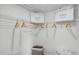 Organized walk-in closet with shelving, hanging rods, and plenty of space for storage at 2664 Gouda Dr, Apopka, FL 32703