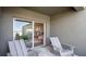 Relaxing covered patio with sliding glass doors that lead inside the home at 2672 Gouda Dr, Apopka, FL 32703