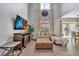 Bright and airy living room with soaring ceilings, tile flooring, and natural light at 2801 Lido Key Ct, Kissimmee, FL 34747