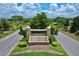 Stevens Plantation entrance sign with a stone waterfall feature welcomes residents and guests to a luxurious community at 3180 Pawleys N Loop, St Cloud, FL 34769