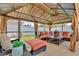 Inviting gazebo area with comfortable seating, offering a relaxing outdoor space at 3180 Pawleys N Loop, St Cloud, FL 34769