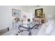 Inviting living room featuring stylish decor, comfortable seating, and an abundance of natural light at 3180 Pawleys N Loop, St Cloud, FL 34769