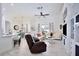 Open concept living room with comfortable seating and elegant decor at 3180 Pawleys N Loop, St Cloud, FL 34769