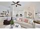 Spacious living room with a view of the kitchen and dining area at 3180 Pawleys N Loop, St Cloud, FL 34769