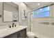 Updated bathroom showcasing modern fixtures, a glass-enclosed shower, and a sleek vanity at 3214 Regal Crest Dr, Longwood, FL 32779