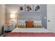 Charming bedroom featuring a comfortable bed, stylish decor and a serene atmosphere at 3214 Regal Crest Dr, Longwood, FL 32779