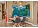 Charming dining area with views of the screened in lanai and backyard at 3214 Regal Crest Dr, Longwood, FL 32779