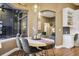 Elegant dining area featuring modern light fixtures, and an open floorplan at 3214 Regal Crest Dr, Longwood, FL 32779