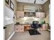 This home office features custom built-ins, a granite desktop and views of the yard at 3214 Regal Crest Dr, Longwood, FL 32779