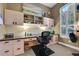This home office features custom built-ins, a granite desktop and a large window at 3214 Regal Crest Dr, Longwood, FL 32779
