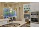 Gourmet kitchen with stainless steel appliances, double ovens, and a breakfast nook with views at 3214 Regal Crest Dr, Longwood, FL 32779