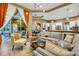 Open-concept living room with seamless transition to the outdoor living space and gourmet kitchen at 3214 Regal Crest Dr, Longwood, FL 32779